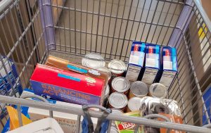 Image of shopping cart full of dry and cnaned goods