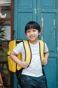 child with backpack