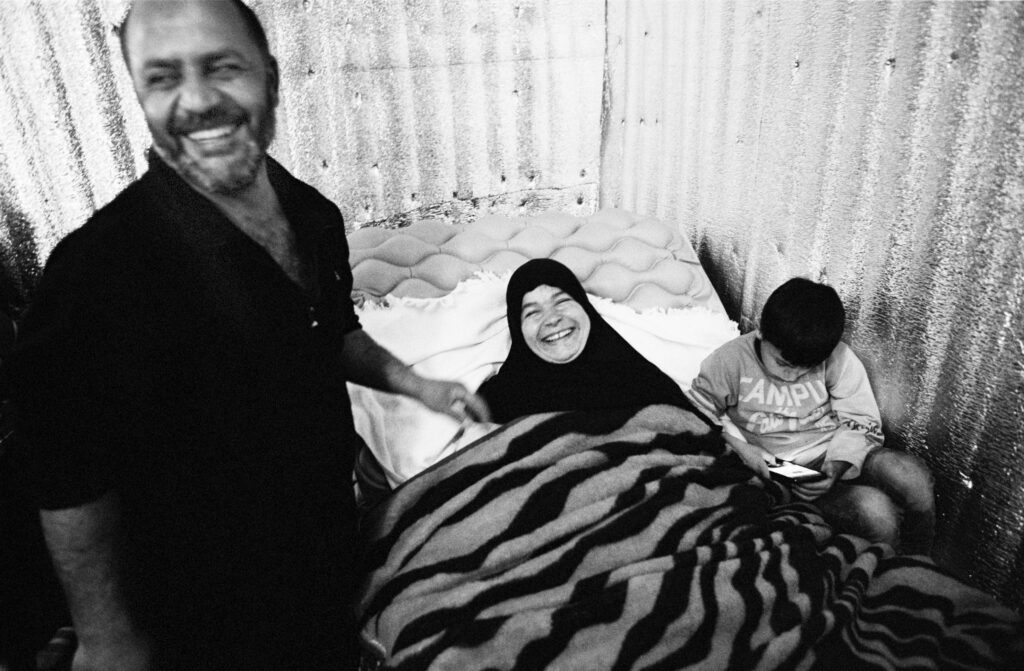 Three Syrian refugees in Lebanon. Khouloud, Jamal and their youngest son Hamza - Bekaa Valley, Lebanon, Feb 2016